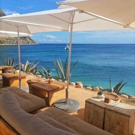 Overview of waterfront lounge area at Amante Beach Club Ibiza