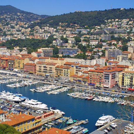 Aerial view looking down on the marina in Nice, with many superyacht charter yachts berthed