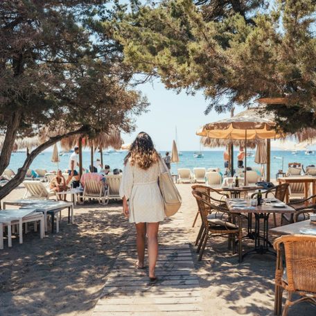 Tropicana Ibiza with charter guest walking