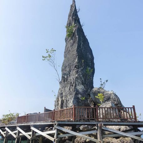 View of Batu Pensil surrounded by wooden decking 