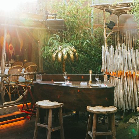 Small table and stools at Playamigos