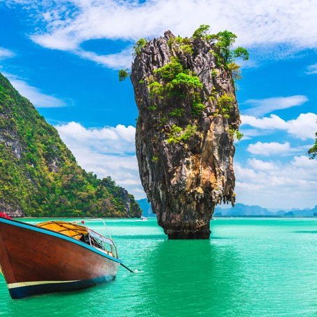 Phang Nga Bay with a small boat in the foreground