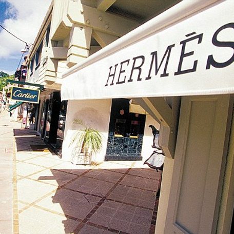 Premium shopping street with Hermes and Cartier store fronts