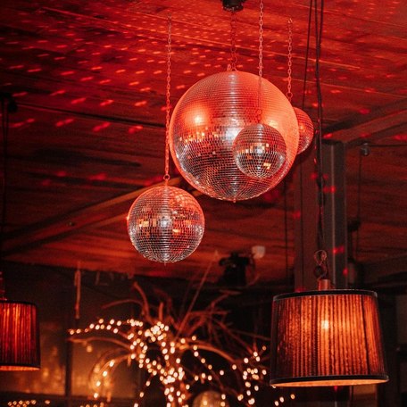 Roto's interior illuminated by their iconic red lighting 
