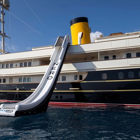 Overview of an inflatable slide attached to charter yacht NERO