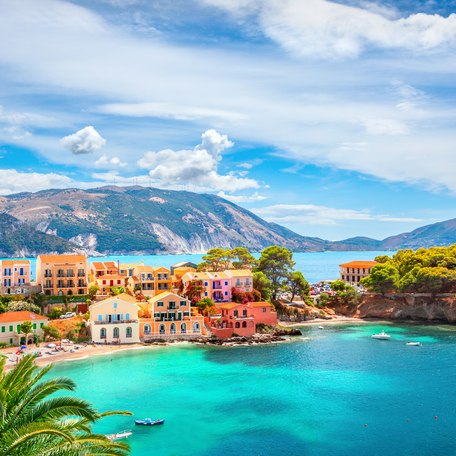 Overhead view looking down on Kefalonia coastline and colored buildings