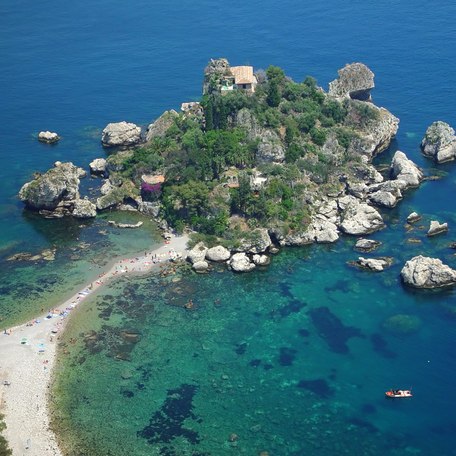 Aerial view looking down on the islet of Isola Bella, Sicily