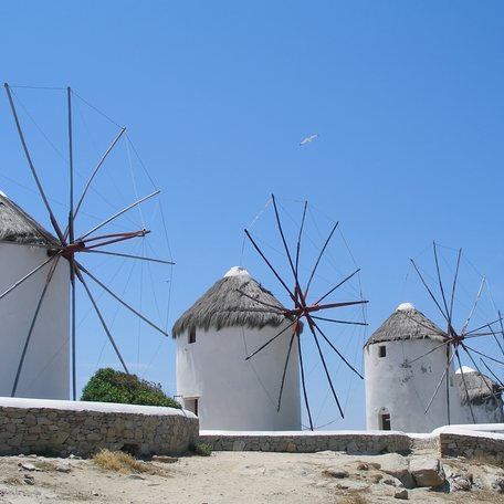 Overview of a line of Cycladic windmills on the island of Mykonos