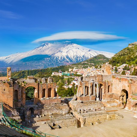 Ancient ruins in Italy, with views looking over snow-capped mountains