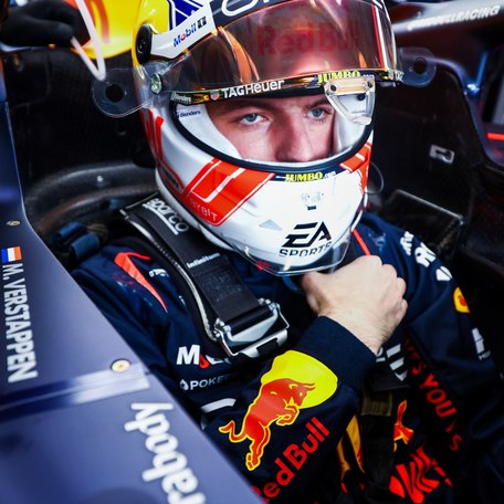 Close up of a Formula One racer with his visor lifted