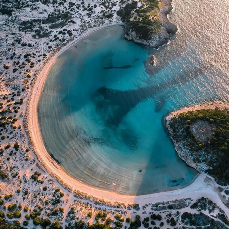 Birds eye view of Voidokilia's omega-shaped beach 