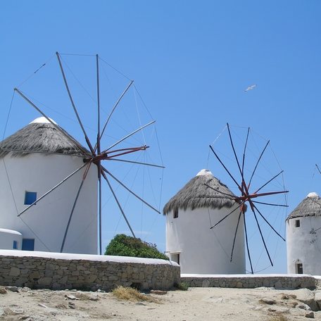 A line up of windmills on view during a Mykonos yacht charter