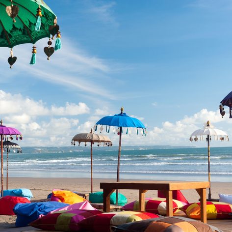 Decorated high umbrellas on the Indonesian beach