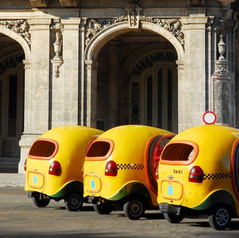 Cocotaxis lined up in Cuba