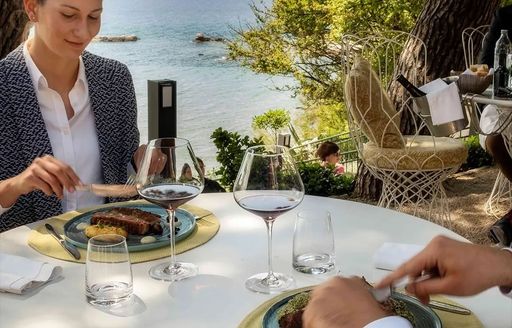 Female charter guest dining at Dvor, Croatia