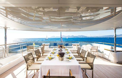 Alfresco dining area on charter yacht VERTIGO