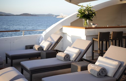 Sun loungers on superyacht GEMS II