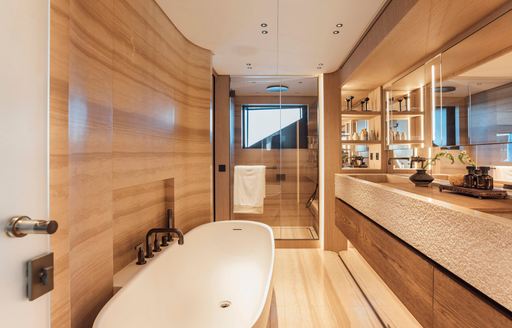 Ensuite with bath and shower cubicle onboard charter yacht ANDIAMO
