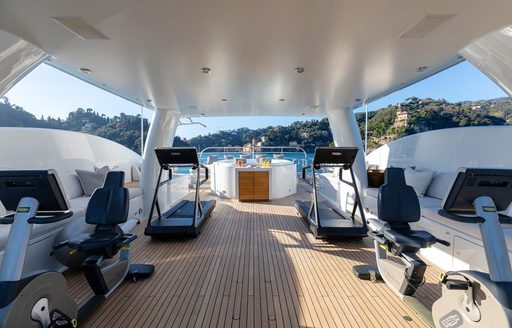 Sundeck gym on board charter yacht REVELRY