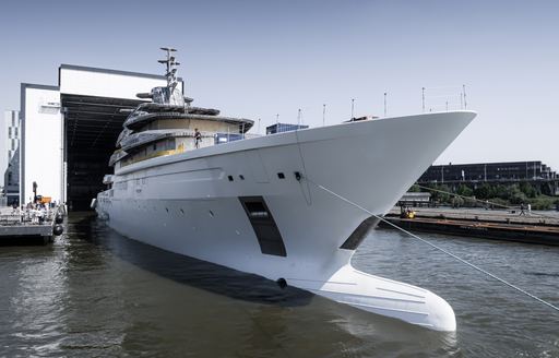 Superyacht LEVIATHAN being towed out of construction shed
