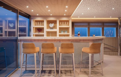 Chairs around bar of sailing yacht Love Story