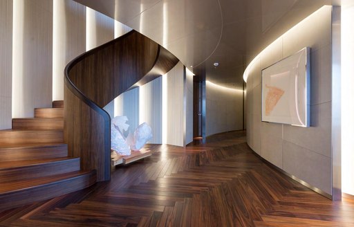 Lobby area on superyacht SAVANNAH, with staircase winding down