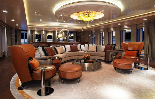 Sofa seating area on charter yacht HONOR