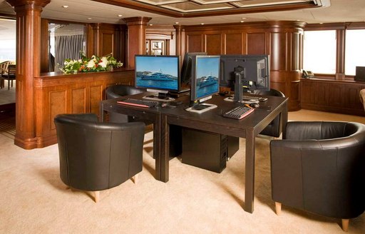 Entertainment center onboard charter yacht NOMAD, with multiple computer stations center