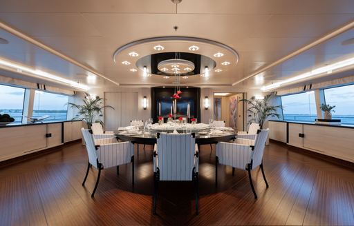 Interior dining area onboard charter yacht ETERNITY