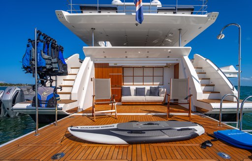 Overview of the beach club with watersports equipment on the swim platform of charter yacht CARPE DIEM 