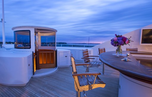 bar and 'pop top' staircase on sundeck on superyacht RHINO 