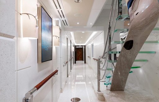 Glass staircase on megayacht EQUANIMITY