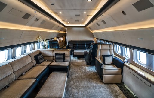 plush interiors of private jet plane