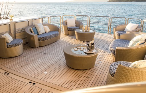 Seating arrangement set up on aft swim platform of luxury catamaran SPIRT