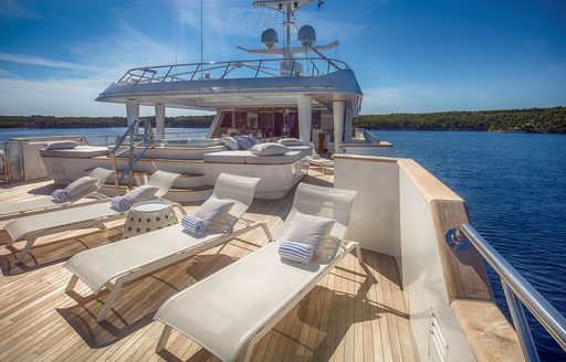 Sun loungers on deck of charter yacht KATINA