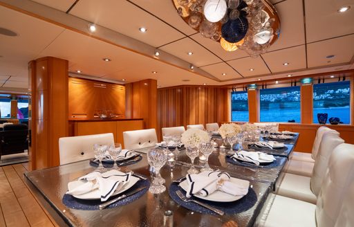 Charter yacht VICTORIA DEL MAR interior dining table