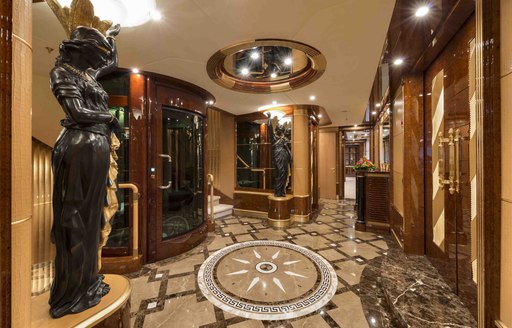 A statue and ornate flooring featured on board superyacht 'Mine Games'