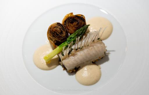 A plate of superyacht cuisine with asparagus tip