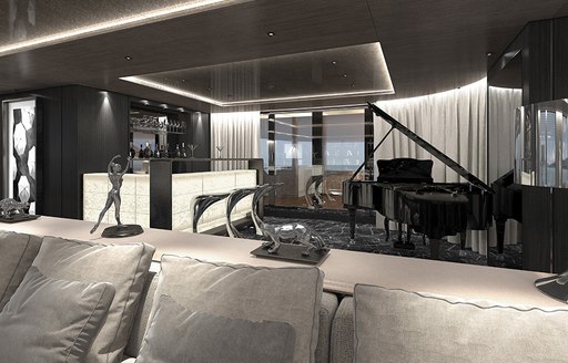 sofa, bar and grand piano in the skylounge aboard superyacht SOLO