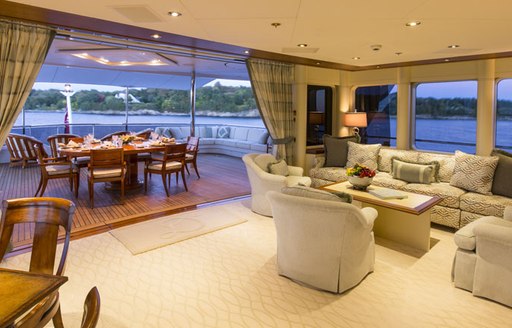 semi-alfresco dining on upper deck aft of superyacht ‘Blue Moon’