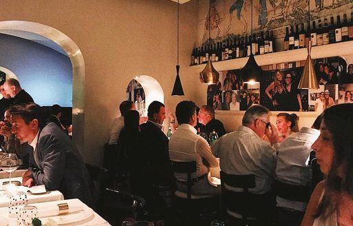 Capri - Aurora dining area people
