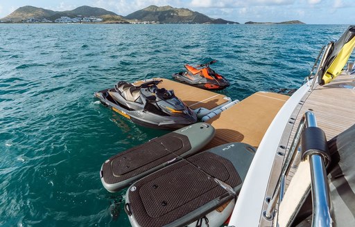 A mixture of water toys on the swim platform of charter yacht MOSKITO