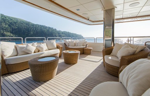 Alfresco lounging area on motor yacht PANAKEIA 