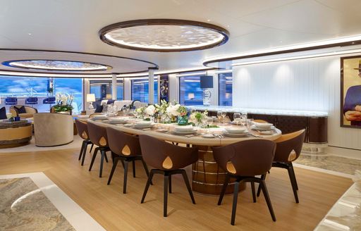 Interior dining area onboard superyacht charter EXCELLENCE