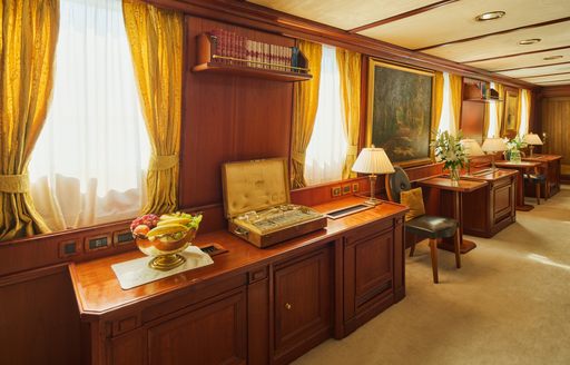 Charter yacht SEAGULL II interior sideboard and curtains on windows