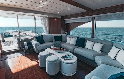 Main deck salon area decorated with nautical colors 