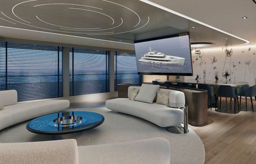 Charter yacht ORIY interiors with seating and dining area