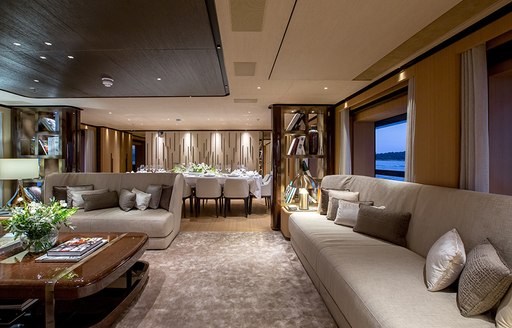 Main salon and formal dining on superyacht VERTIGE