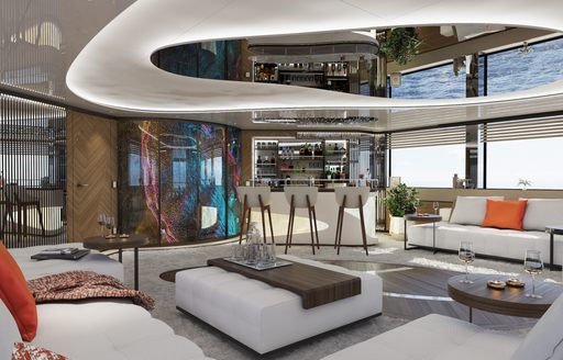 Overview of the main salon lounge area and wet bar onboard superyacht charter ETERNAL SPARK