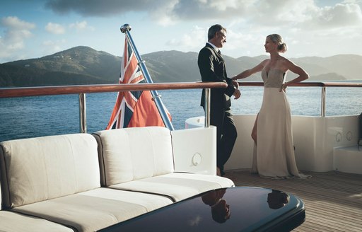 charter guests dress up for evening aboard charter yacht MEAMINA 